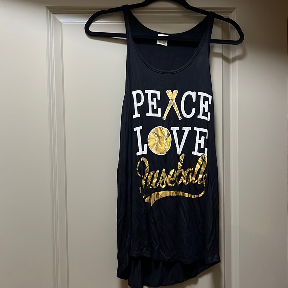 Boutique tank top. Runs big- size medium
